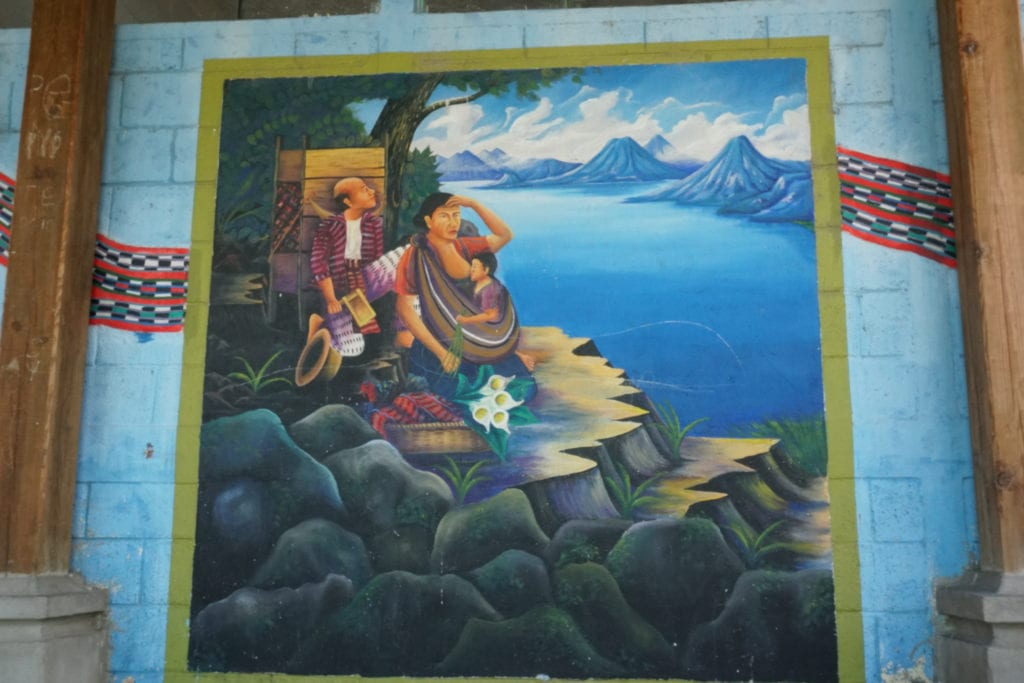 Wall mural Mayan family looking over Lake Atitlan