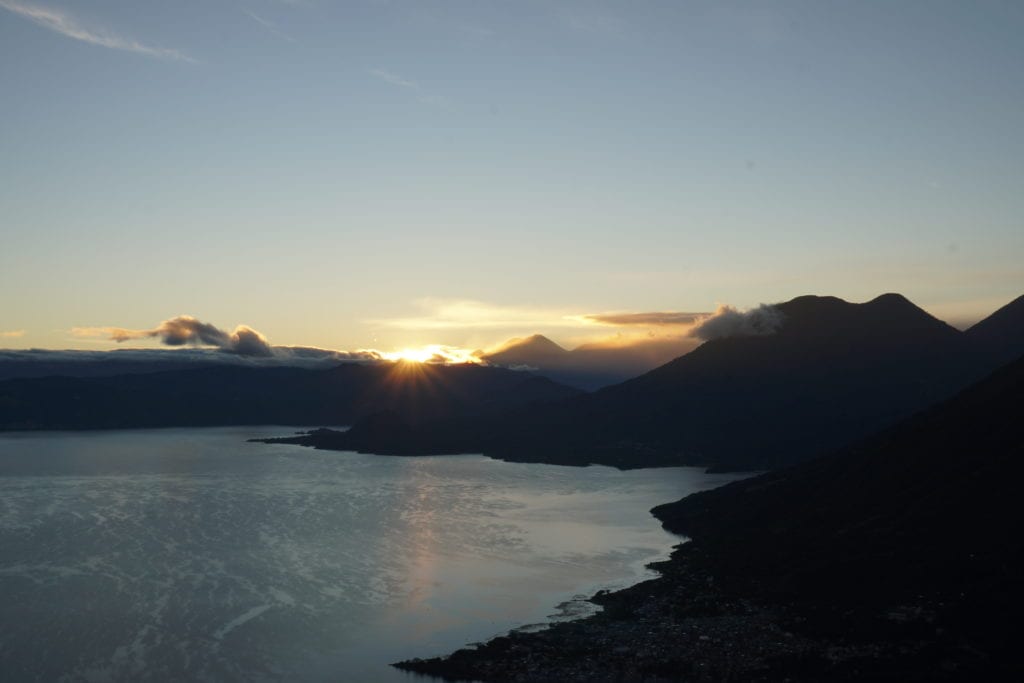 Lake Atitlan view at start of cresting sunrise