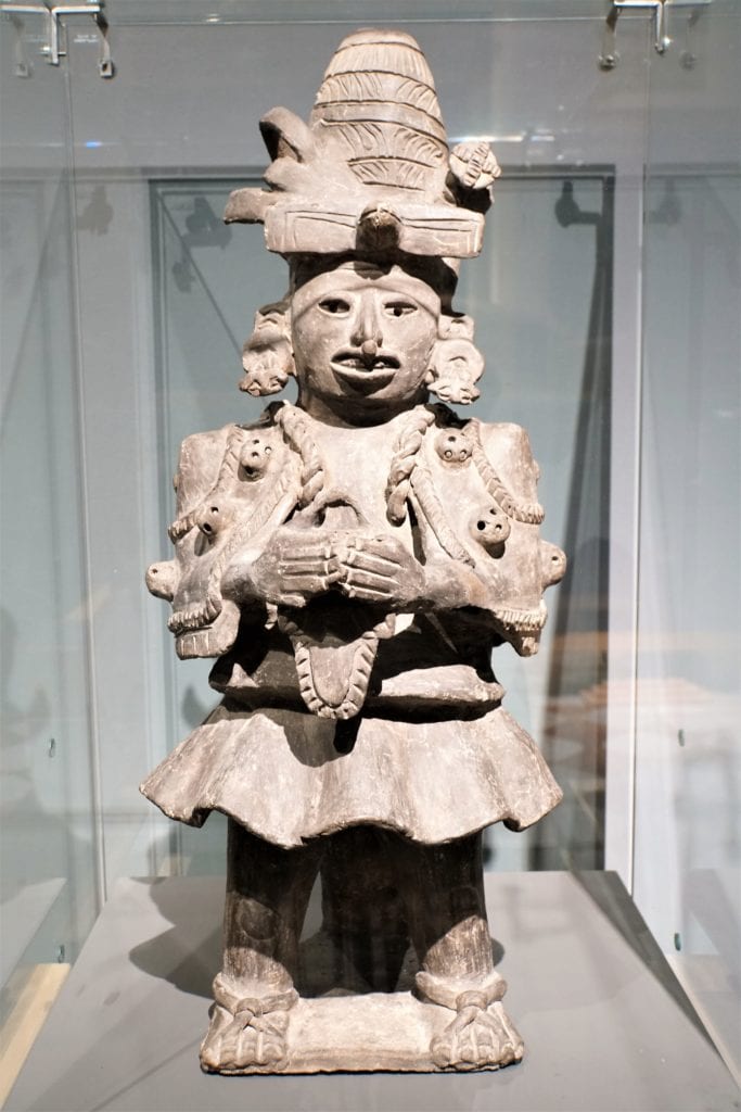 Mayan human stone figure at Palacio Cantón