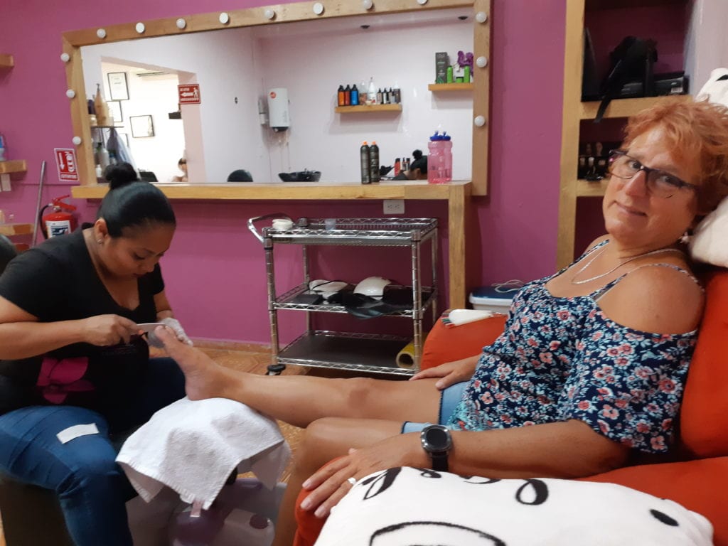 Cindy receiving a pedicure