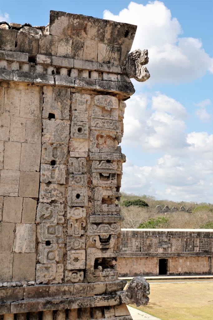 Chac god symbols displayed on structure at Nunnery Uxmal