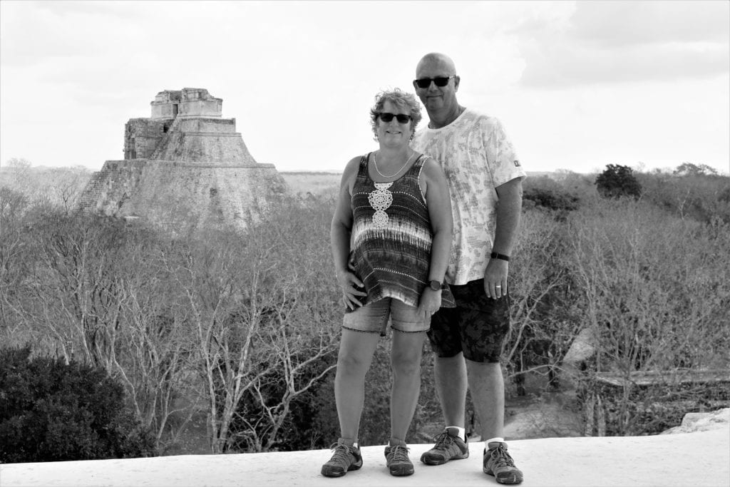 Black & white viewing Magician pyramid in background Uxmal