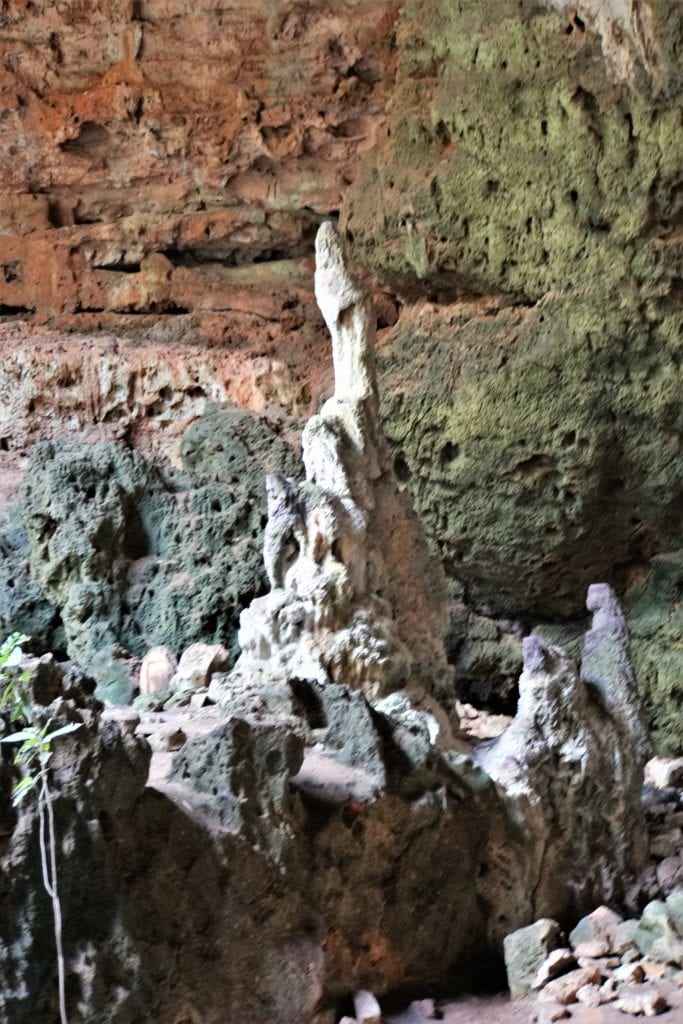 Grottoes Loltun Caves stalactites one looks like a coyote howling into the darkness