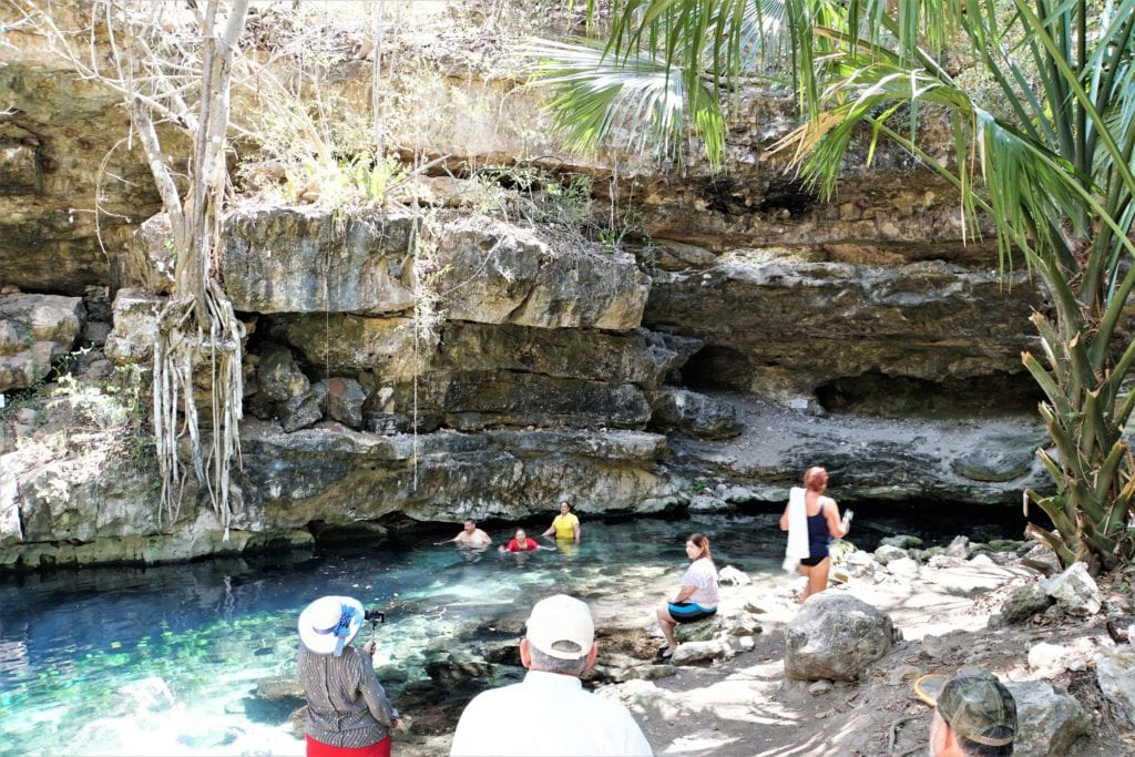 People enjoying cenote X’batun