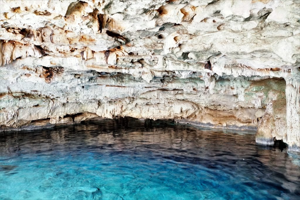 Looing at Cenote Dzonbacal