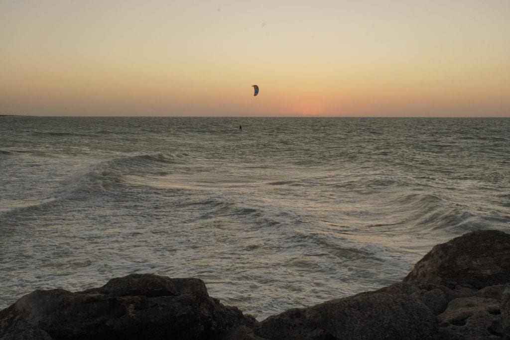 Kite boarding at Chuburna Puerto after sunset