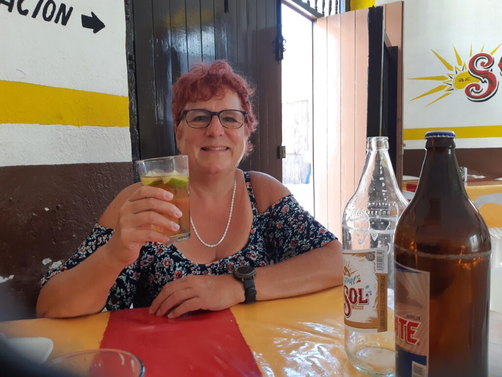 Cindy enjoying appies and a cerveza local pub