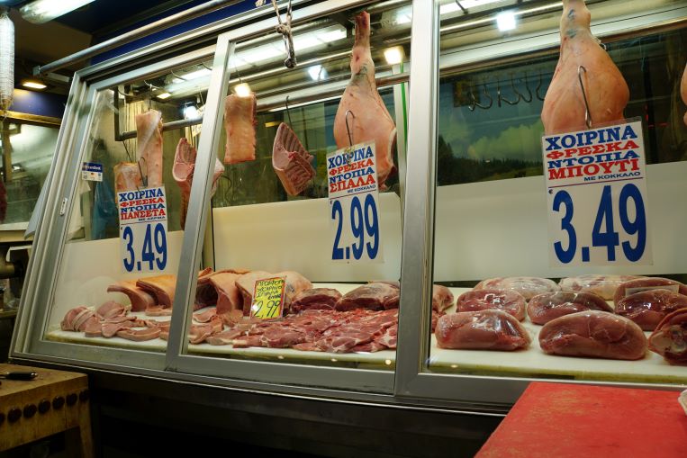 pork meat hanging in the Athens market