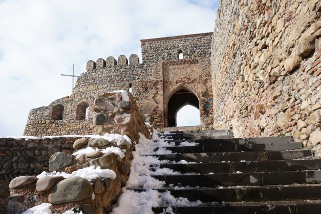 Snow covered staircase at Gori Fortress