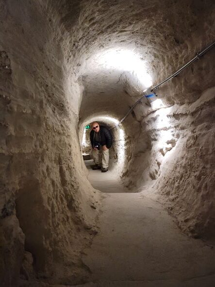 Walking through tunnel at Vardzia