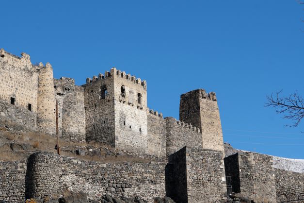 Walls of Khertvisi Fortress standing atop of a mountain