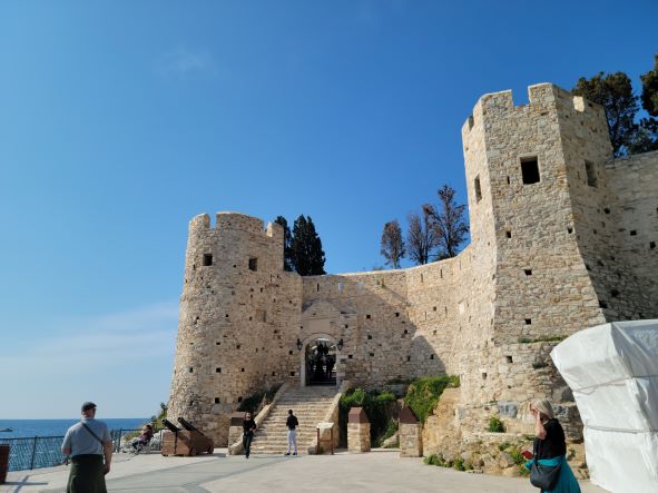 Entrance with towers to Güvercinada castle in Kusadasi