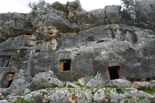 Carved figures at rock tombs near Kanlıdivane