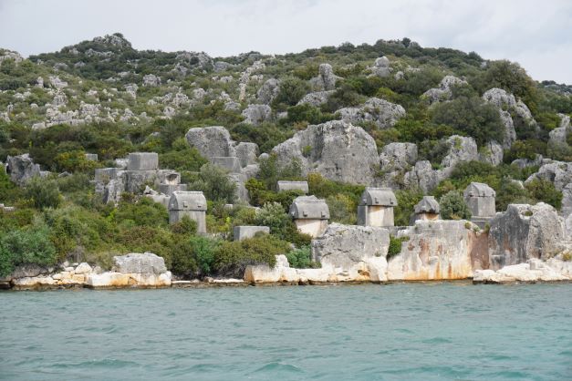 Lycian rock tombs spread out on shore