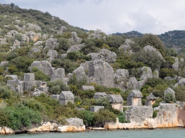 Lycian rock tombs spread out on the shore