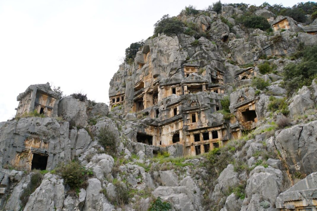 Myra rock tombs spread out on rock wall