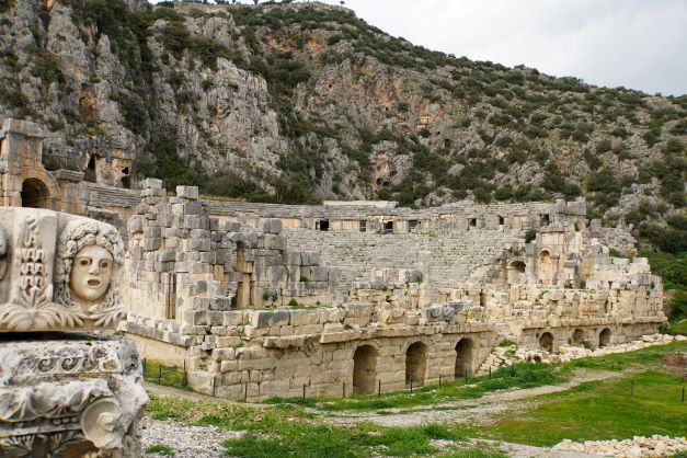 Myra carved face with theater in backgound