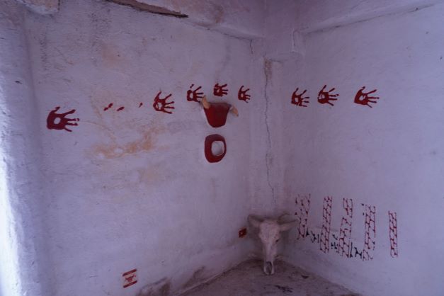 Wall pictures of hand prints at mock house at Çatalhöyük